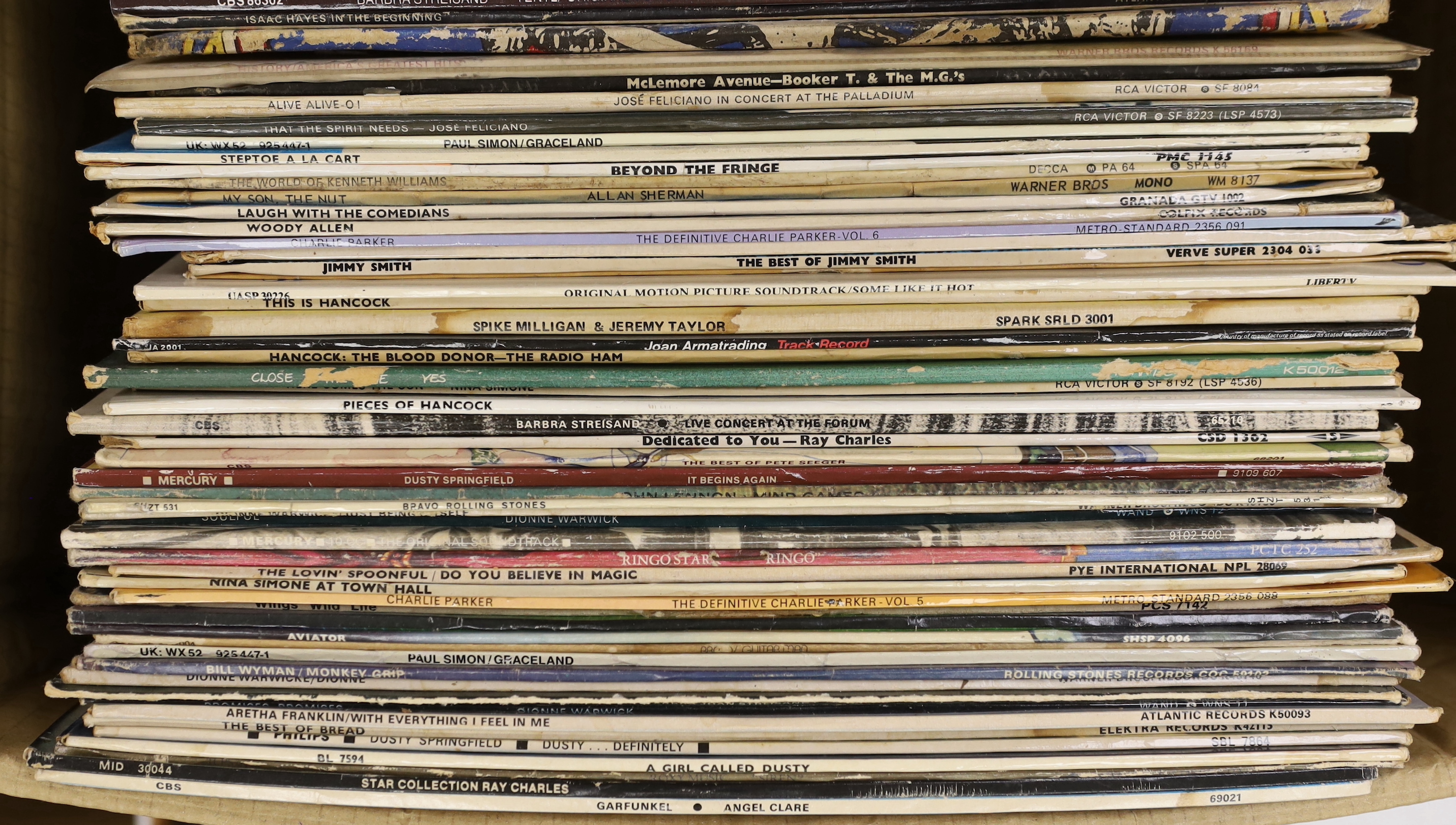 Sixty-four LP record albums with artists including; Brook Benton (signed album), Rolling Stones, Paul McCartney, Dionne Warwick, Elvis Presley, Grateful Dead, Paul Simon, Beyond the Fringe, Nina Simone, Ray Charles, John